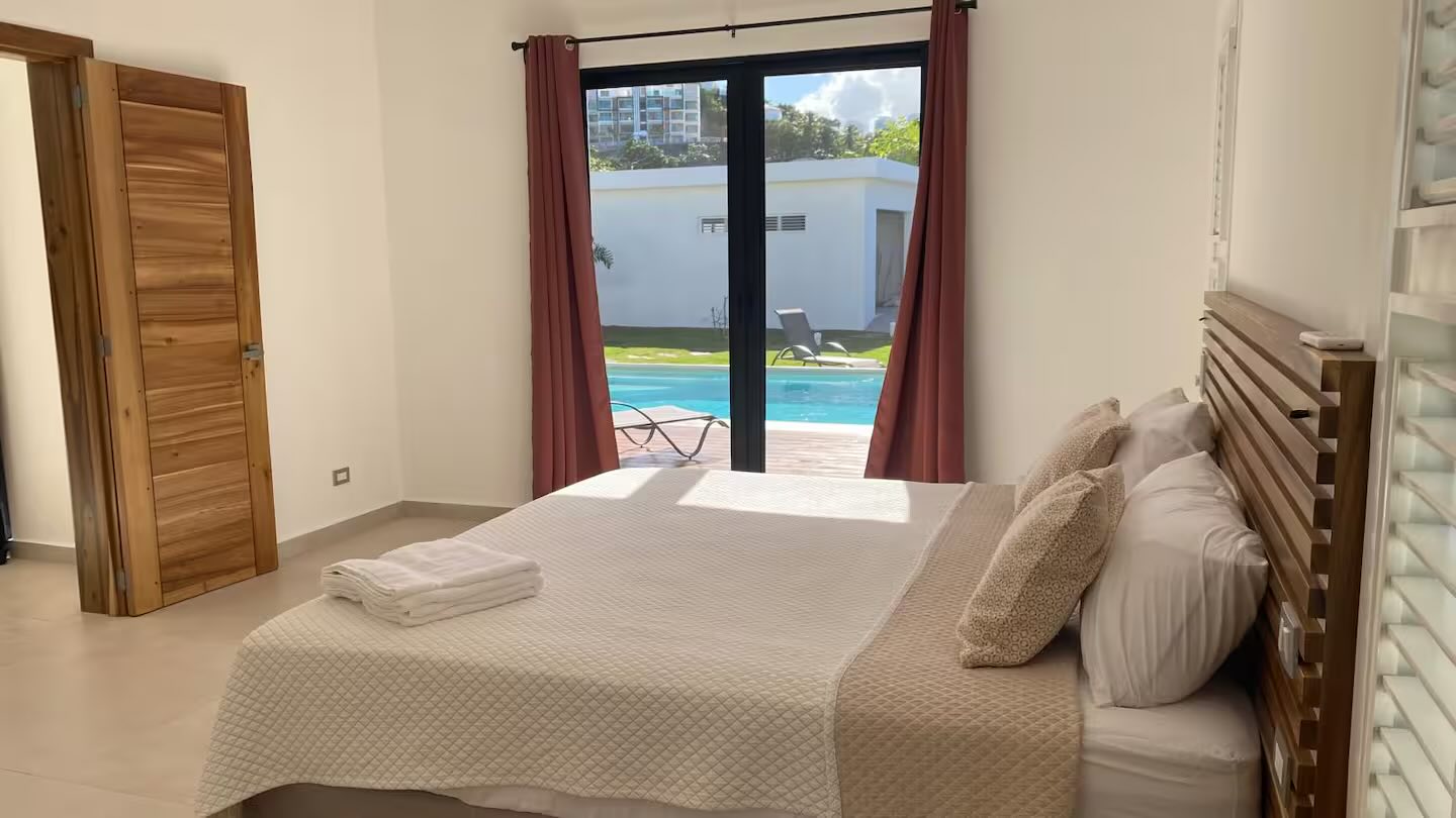 Villa Anick, ground-floor bedroom, with a view of the pool