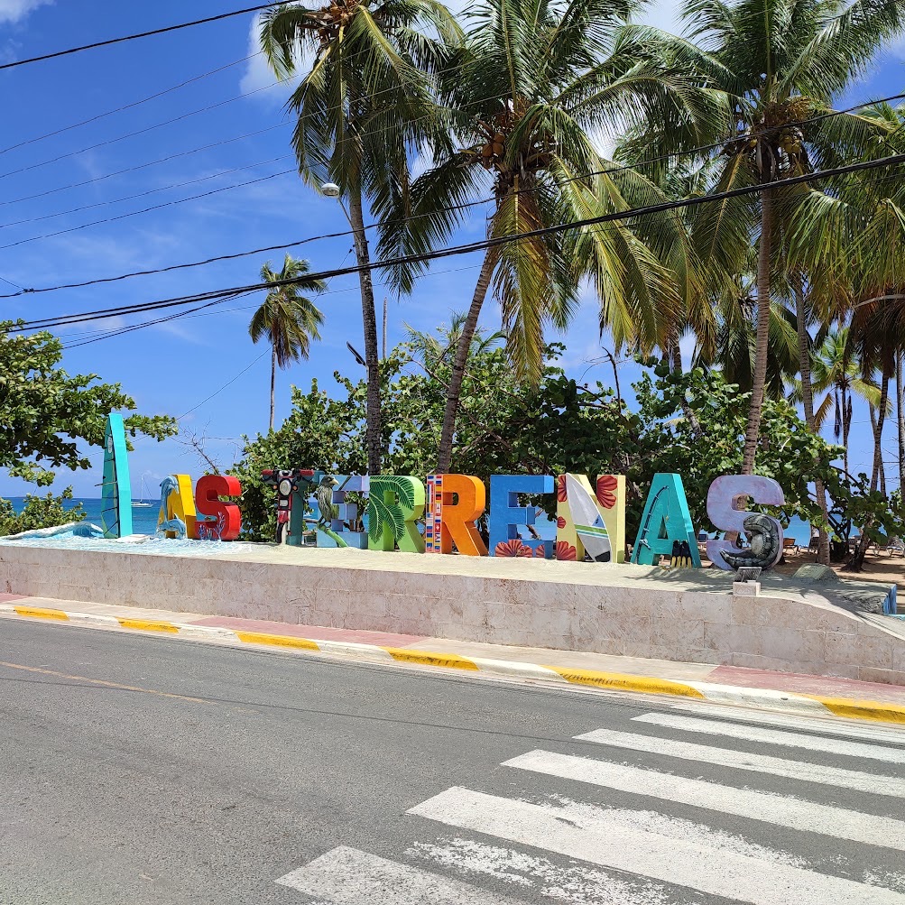 Large colorful letters spelling Las Terrenas, by the beach