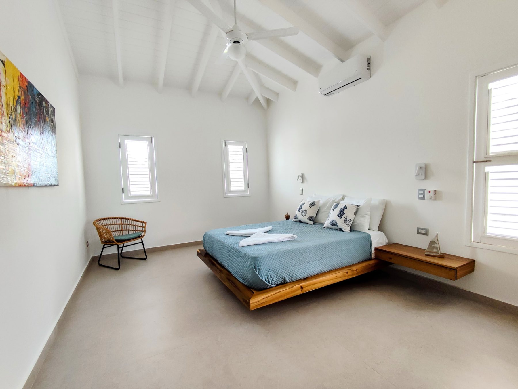 Villa Way, bedroom with exposed roof beams